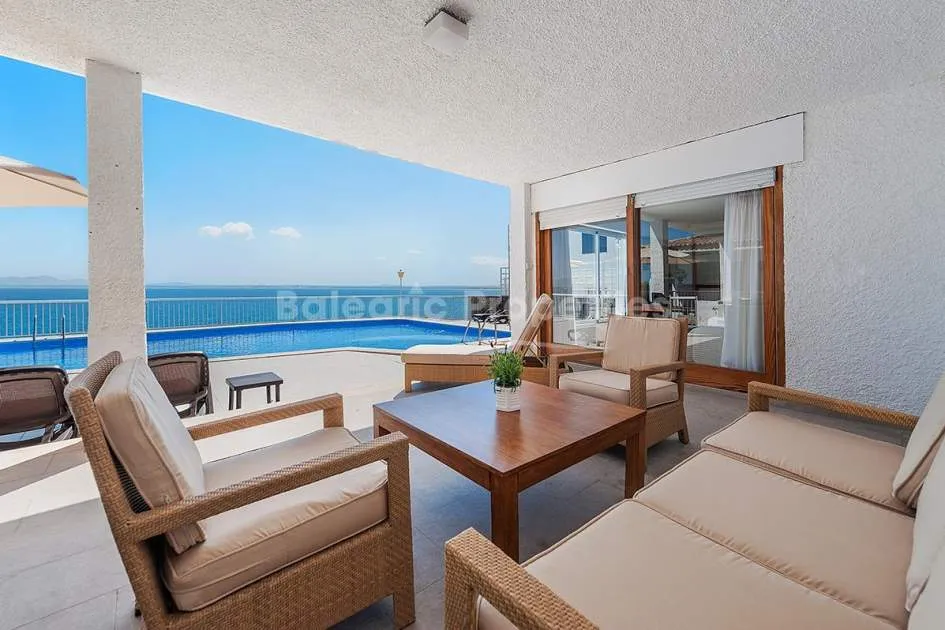 Frontline villa with holiday rental license for sale in Alcanada, Alcúdia, Mallorca