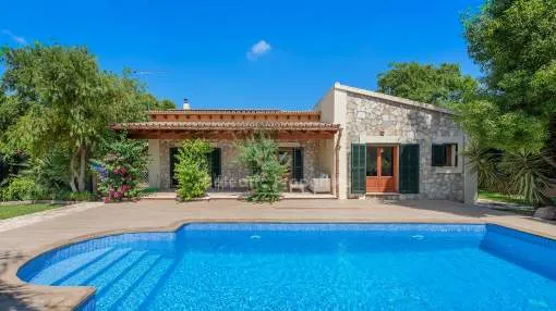 Family villa with attractive stone facade and pool for sale near Pollensa, Mallorca