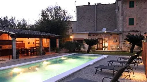Traditional town house near idyllic mountain landscape in Sóller Traditional town house near idyllic mountain landscape in Sóller