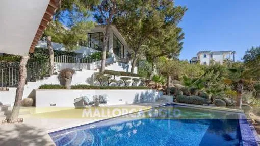 Charming property with modern flair above the bay of Cala Llamp