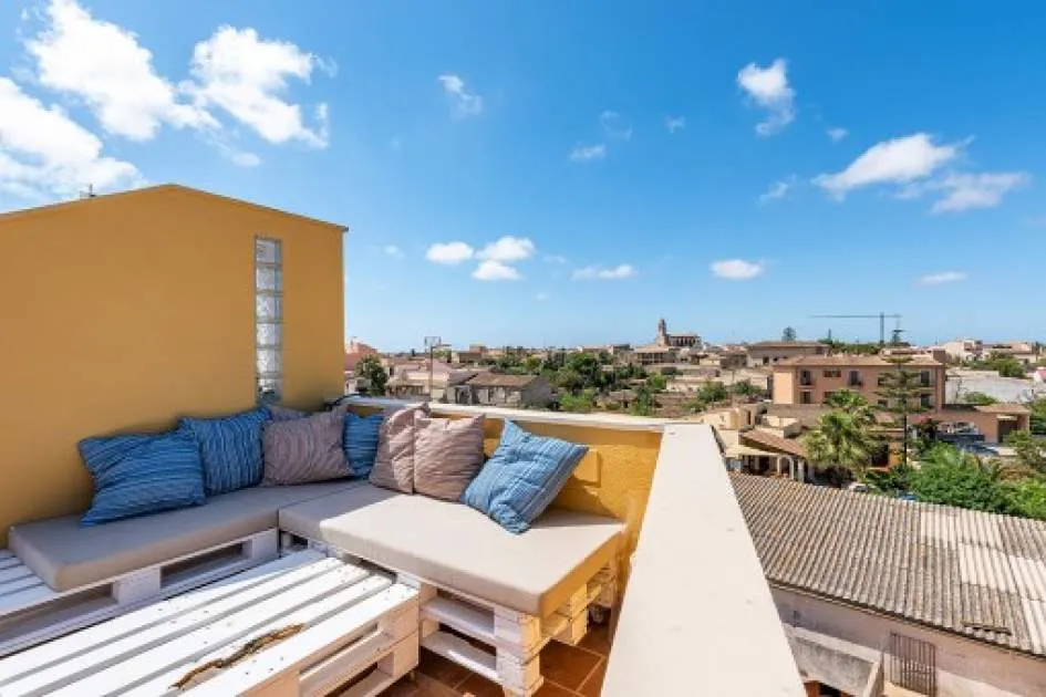 Beautiful and modern terraced house with patio and large roof terrace in Santanyi