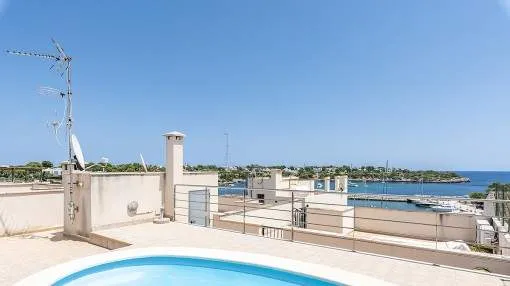 Well-maintained apartment with pool on the roof and sea views, only a few metres from the harbour of Porto Petro