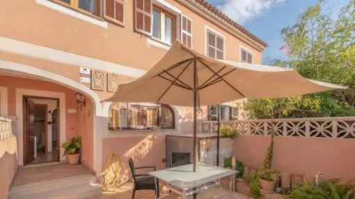 Townhouse in a small community in a central location in Cala Ratjada, with heating and private garage