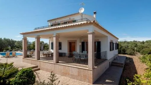 Beautiful country house with rental license on large private plot with distant sea views in Portol
