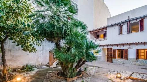 Fantastic town house with patio and a second house with a garage, in the port of Cala Ratjada Fantastic town house with patio and a second house with a garage, in the port of Cala Ratjada