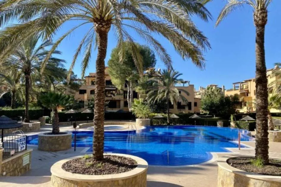 Spacious ground-floor apartment with wonderful garden and communal pool in Puig de Ros
