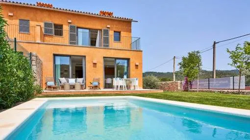 Newly-built, Mallorcan-style terraced house with private garden and pool in Es Capdella