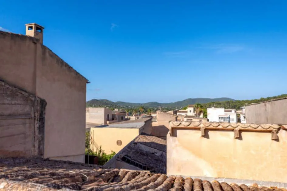 Classic Mallorcan town-house requiring renovation on the town square of Son Servera