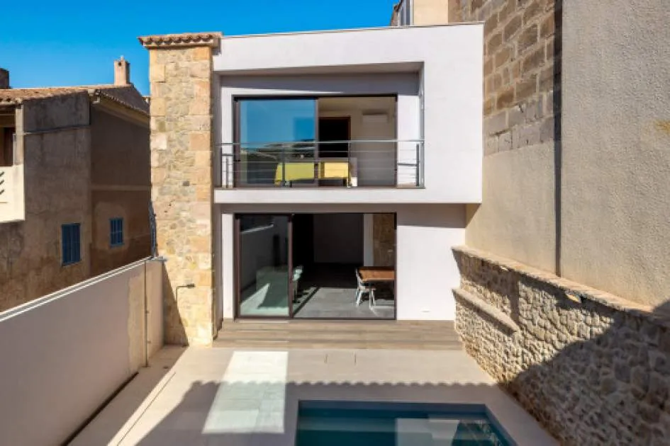 Newly renovated townhouse with a private guesthouse, garage, and pool in Sant Joan