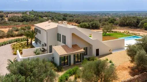 Exclusive newly-built finca with pool and breathtaking sweeping views as far as Cabrera quietly located in Ses Salines