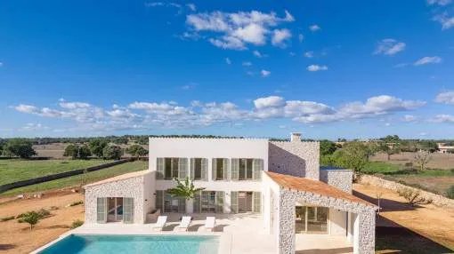 Elegant new-build finca with panoramic views and Mediterranean flair in the hilly landscape of Cas Concos