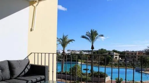 Modern apartment in a well-maintained residential complex with communal pool in Portocolom