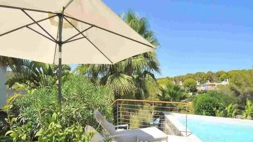 Modern villa with pool and light-flooded rooms in Sol de Mallorca Modern villa with pool and light-flooded rooms in Sol de Mallorca