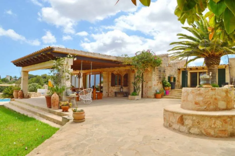Mediterranean finca with three guest apartments, pool and beautiful views of the sea near Es Carritxo