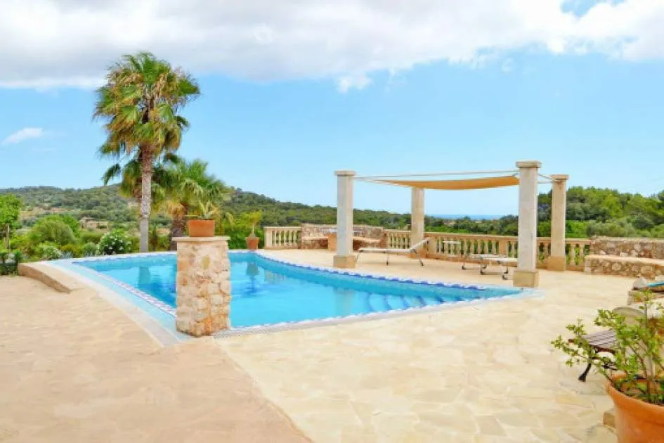 Mediterranean finca with three guest apartments, pool and beautiful views of the sea near Es Carritxo