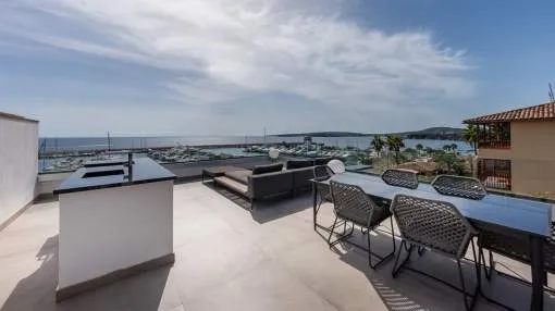 Contemporary style apartment located in the heart of Puerto Portals with amazing sea and harbour views