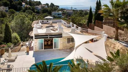 Sunny seaview family villa with a peaceful pool area in Costa d`en Blanes