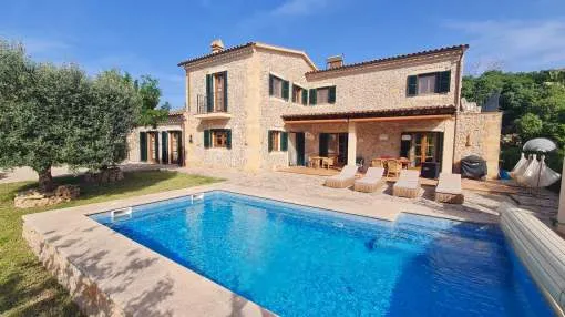 Beautiful spacious 5 bedroom house in Es Capdellà with countryside views, garden and pool