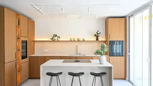A Turnkey Triplex with Custom-Made Design Furniture and Breathtaking Sea Views in Cas Català
