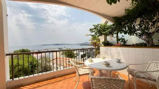 Charming two-bedroom flat with a south-fronting terrace offering direct sea views in Puerto Portals, available for short-term rental