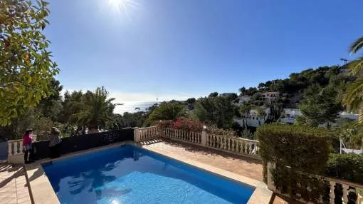 Charming Mediterranean villa with sea views, surrounded by a beautiful garden and located in one of the most prestigious and sought-after areas of the island.