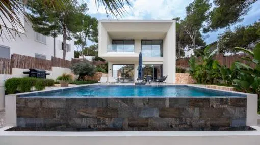 Modern villa in an exclusive and peaceful El Toro location, just steps from the sea and Port Adriano