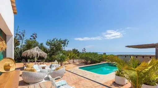 Mediterranean sea view oasis with guest area in sought-after residential location