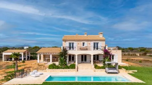 Modern natural stone finca with pool and sea views